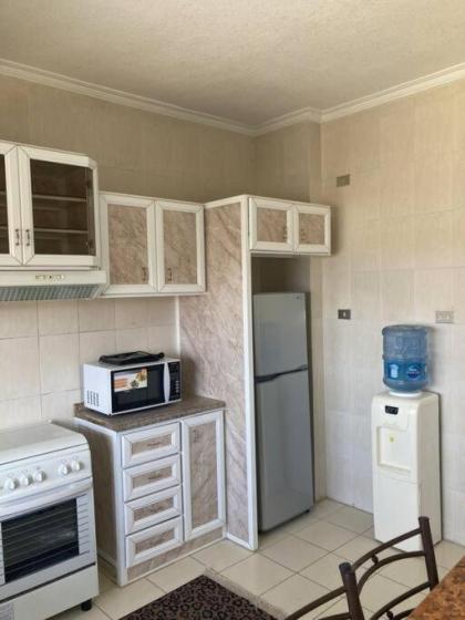 Furnished Family Apartment in Dahyet Al-Rasheed with Free Parking - image 11