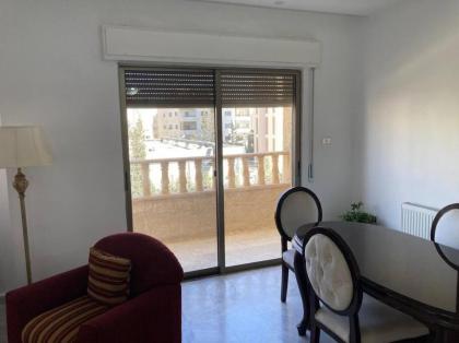 Furnished Family Apartment in Dahyet Al-Rasheed with Free Parking - image 7