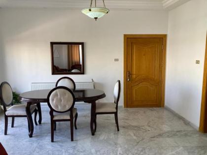 Furnished Family Apartment in Dahyet Al-Rasheed with Free Parking - image 9